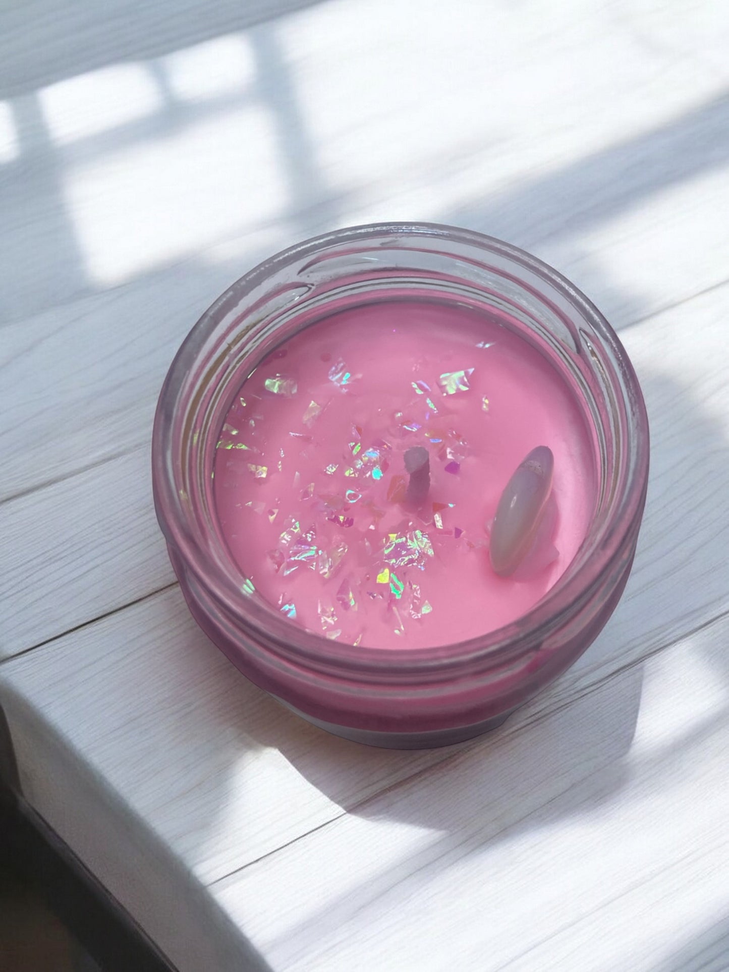 Vela aromática de chicle con piedra de ópalo en forma de corazón